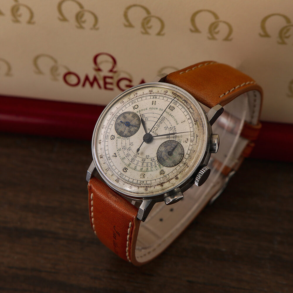 Omega Vintage Chronograph Cal.33.3 with Pulsometric Scale from 1942 with Extract Omega